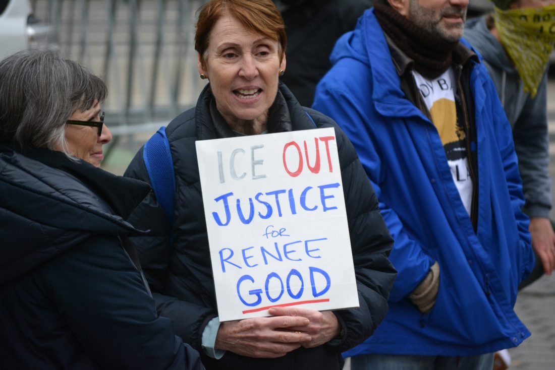 NEW YORK CITY, USA - Anti-ICE protest January 10, 2026. Protest against ICE following the killing of Renee Good by ICE agents in Minneapolis in Foley Square, Manhattan. Woman holds sign saying, "ICE OUT. JUSTICE for RENEE GOOD."