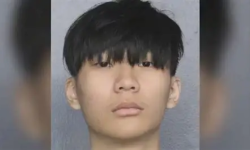Picture of Malone Lam's face looking straight at camera in what appears to be a mug shot.